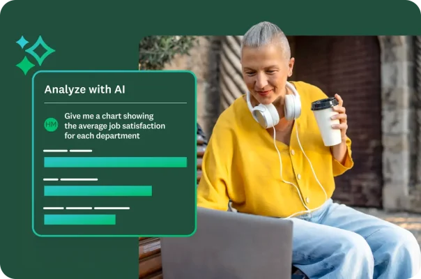 A woman with short, gray hair, headphones, and a yellow cardigan is looking at her laptop on a bench. An "Analyze with AI" panel overlays the image, showing a prompt for "average job satisfaction for each department" and a bar chart.