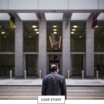 Man staring at building