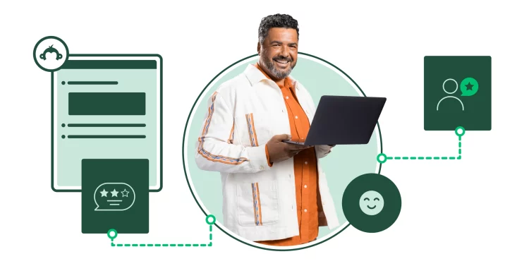 man smiles with laptop next to floating CX graphics