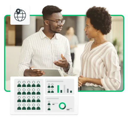 Two people reviewing company DEI survey results