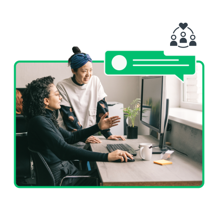 Two people reviewing culture survey results on a desktop