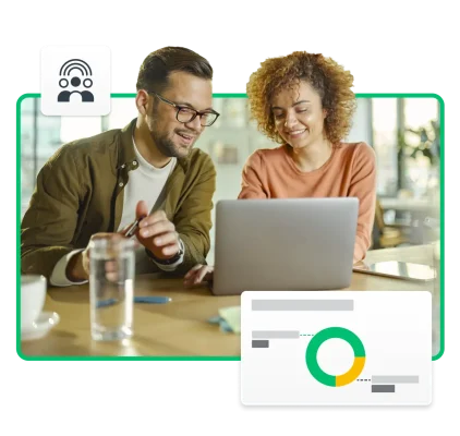 Two people looking at company diversity pit chart on laptop