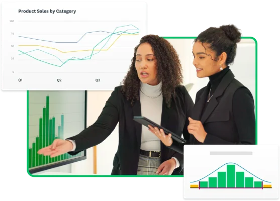 Two women looking at charts