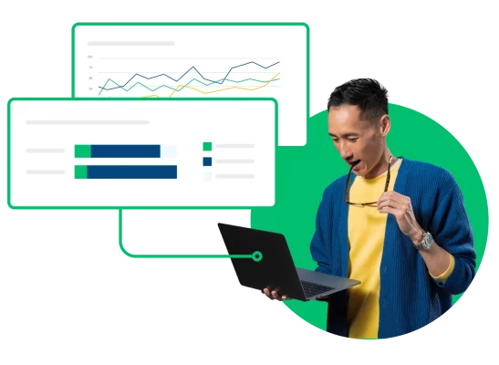 man reviewing charts on a laptop