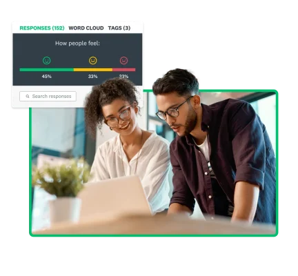 Two people reviewing employee survey results