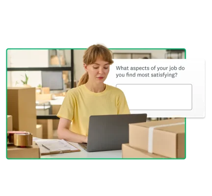 Woman typing on laptop surrounded by packages, next to survey question asking what aspects of your job do you find satisfying