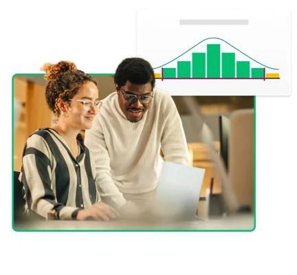 Two people looking at a brand value graph on a laptop