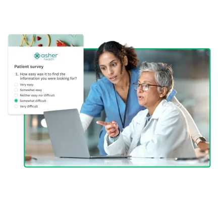 two healthcare workers looking at computer