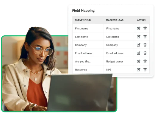 A woman working on the computer with a product screenshot of field mapping.