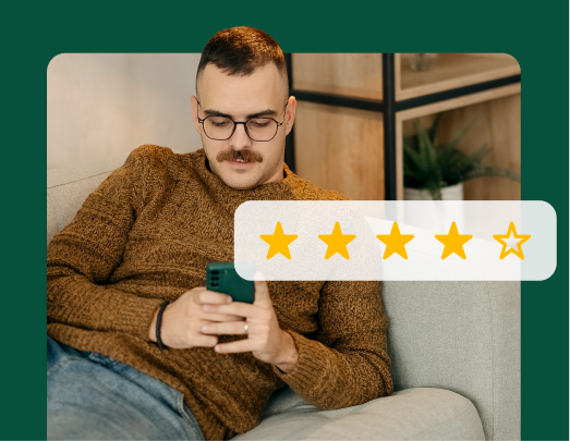 Man typing on his phone, next to 4 stars