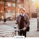 Man smiling on a bike