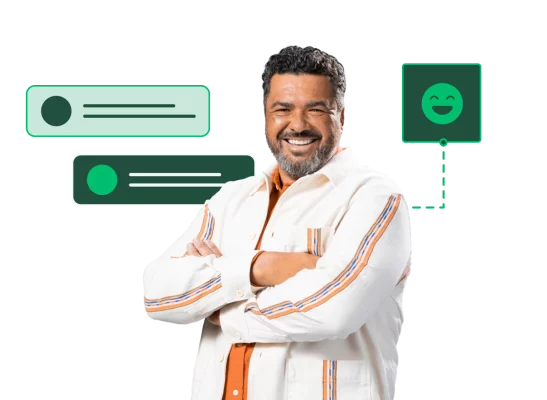 Smiling man with arms crossed with chat bubbles and smiling emoji around him