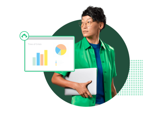 Woman holding laptop under arm with screenshot of bar charts and graphs next to her