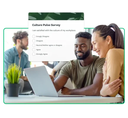 employee feedback culture man and woman looking at laptop