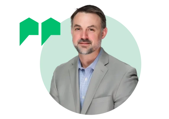 Headshot of John Beaven with quote symbol