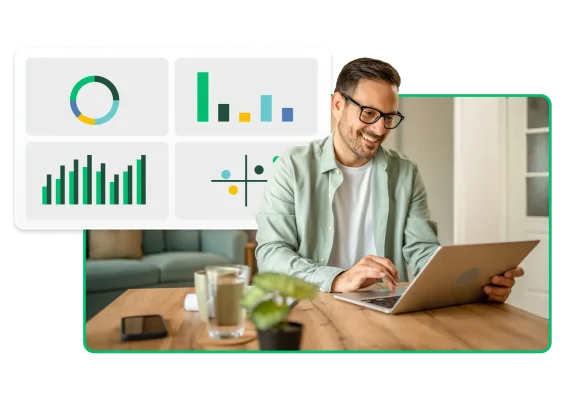 Uomo sorridente che digita sul portatile, accanto a immagini di grafici e diagrammi