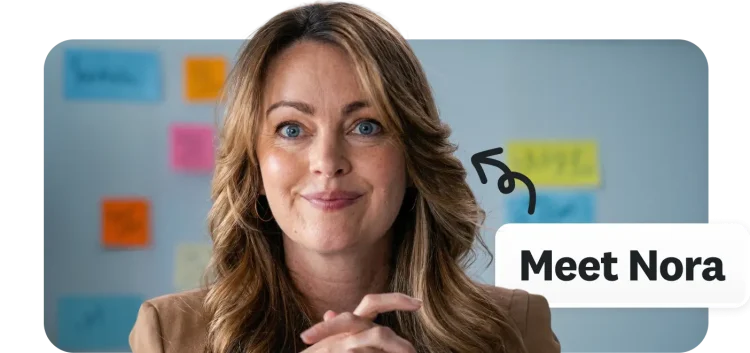 Nervous smiling woman with a sign next to her saying Meet Nora