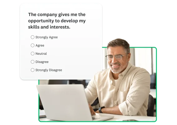 Man working on a laptop next to screenshot of survey question asking about skills development
