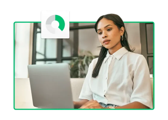 Woman looking at laptop screen, next to a circle graph