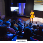 Woman speaking at a conference