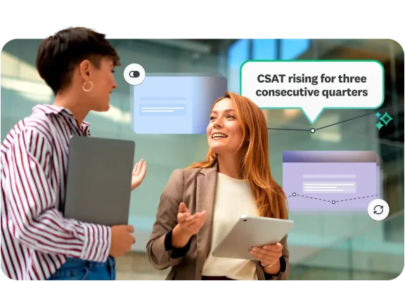 Two professionals in an office discussing customer feedback data with a callout showing CSAT rising for three consecutive quarters