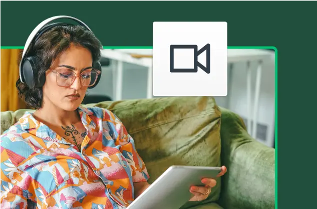 Woman wearing headphones looking at tablet screen, next to video player icon