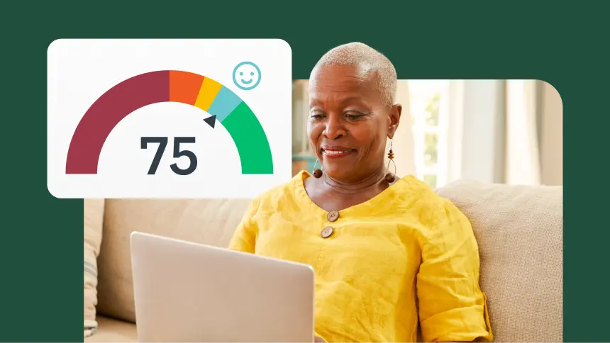 Woman with open laptop, next to a score of 75 and a happy face