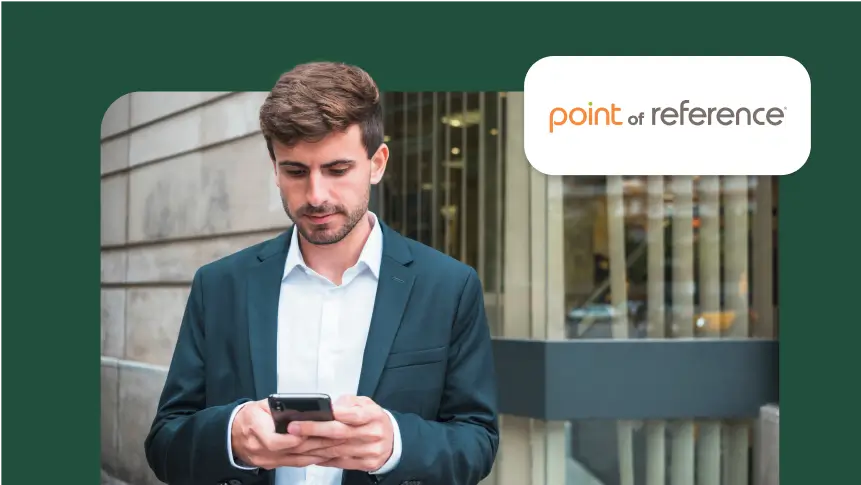 Man in business suit looking on his phone, next to Point of Reference logo