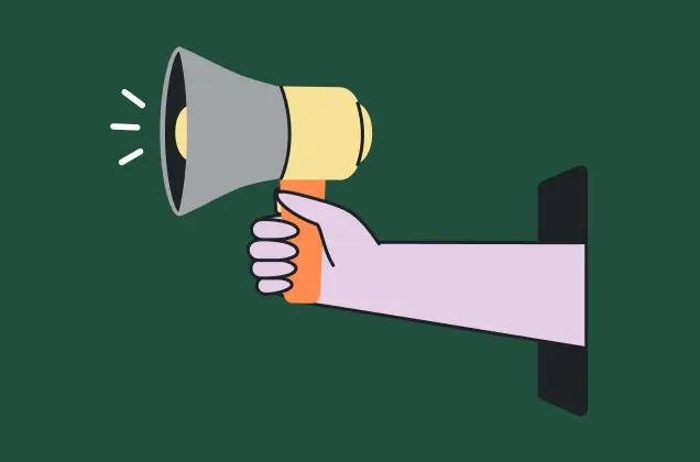 Hand holding a megaphone