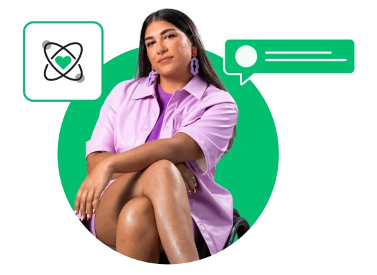 woman sits next to graphics