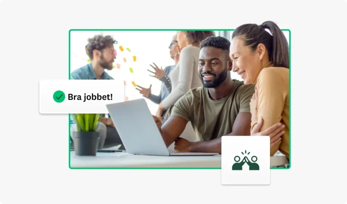 To personer jobber på en bærbar PC sammen