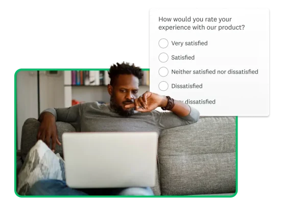 Man sitting on sofa using computer with a product screenshot floating around him.