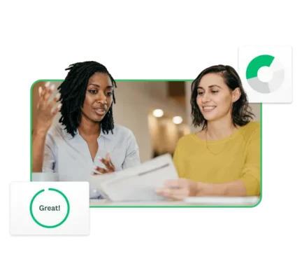 Two people discussing a report