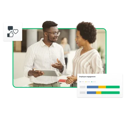 Two people discussing data over a tablet