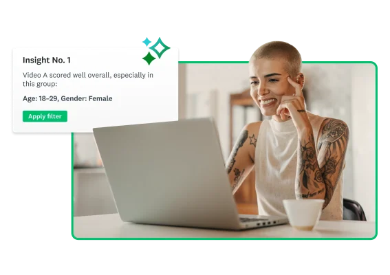 A person smiling while looking at a laptop screen next to an insight about video A scoring well overall with females aged 18–29