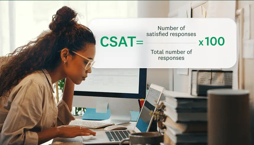 A smiling woman with a laptop, with a graphic overlay that shows the formula for calculating a CSAT score: (Number of satisfied responses / Total number of responses) x 100.