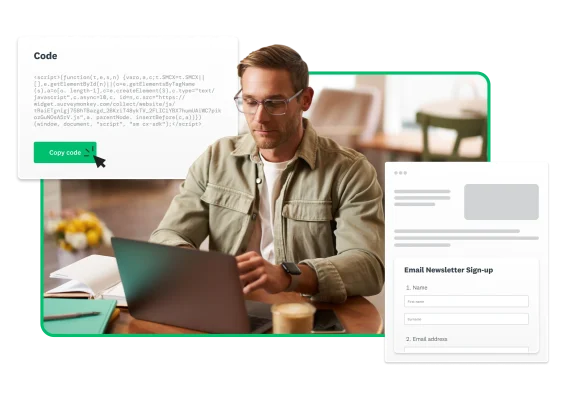 A man sitting at a desk and using a laptop with product screenshots floating around him