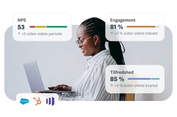 Kvinde skriver på en bærbar computer ved siden af statistikker om engagement og tilfredshed samt eNPS