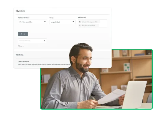 Mies katsoo paperia ja kannettavan tietokoneen näyttöä, ja vieressä on kuvakaappaus SurveyMonkeyn älykkäistä ilmoituksista