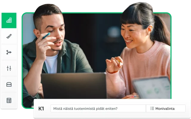 Mies ja nainen istuvat vierekkäin kannettavan tietokoneen ääressä ja luovat kyselytutkimusta SurveyMonkeylla