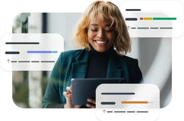 Nainen analysoi näytöllä liiketoiminnan mittareita, kuten työntekijöiden Net Promoter Score (eNPS) ‑pisteitä, sitoutumista ja tyytyväisyyttä.
