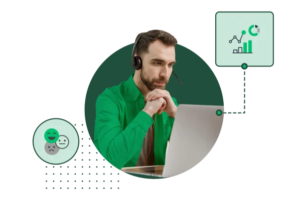 man with headset working on computer