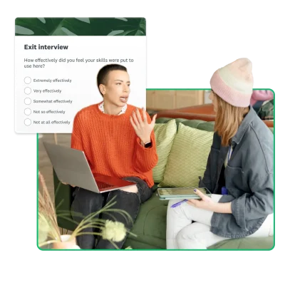 two women discussing survey