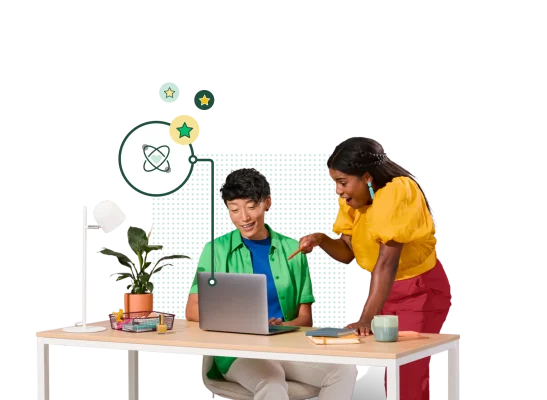 Excited man and woman looking at laptop