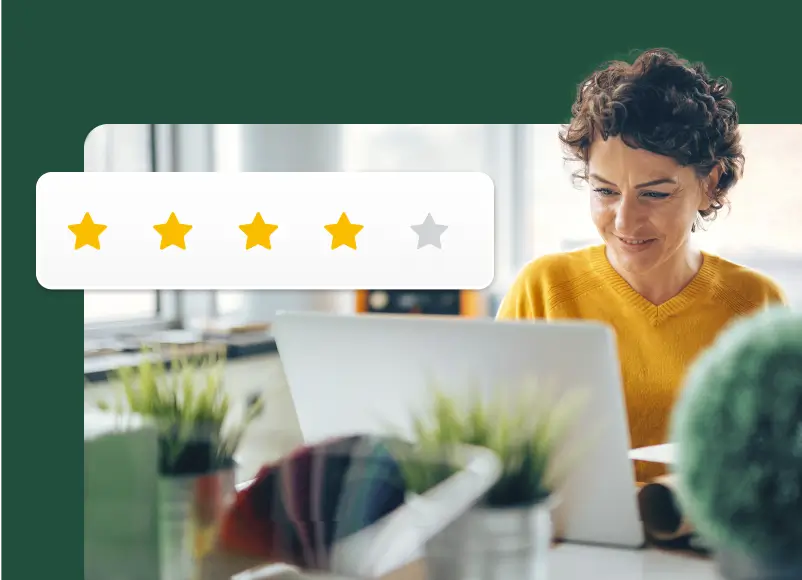 Woman working on laptop next to 4 stars