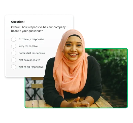Woman in an orange colored hajib sitting at a table with a survey screenshot floating around her.