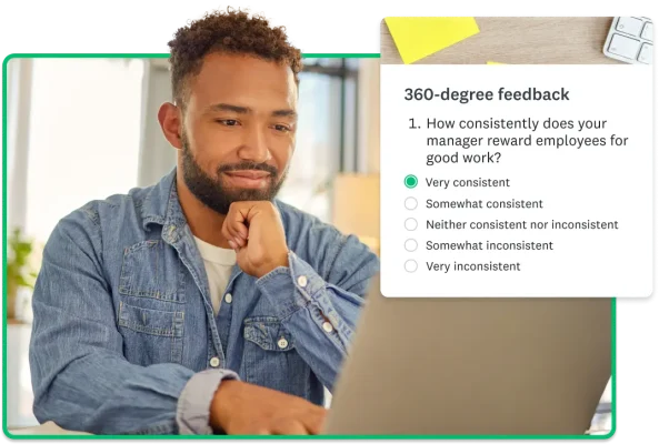 Man working on computer, next to screenshot of 360-degree feedback survey