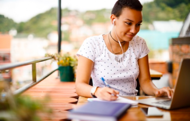 Woman typing at her computer